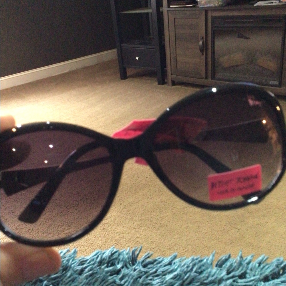 Woman’s new sunglasses by Betsy Johnson